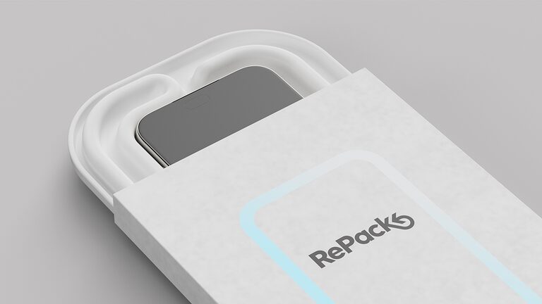 Refurbished smartphone sliding into a branded RePack Sales Pack sleeve
